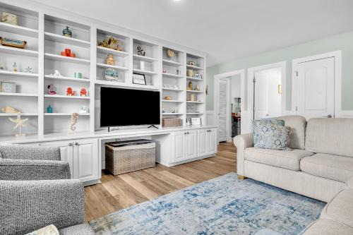 Tranquil Harbour House | Poolside Paradise by Oak Island Accommodations