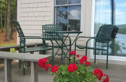 Milton Cottage | Charming lakefront cottage with sandy beach on a large private wooded lot