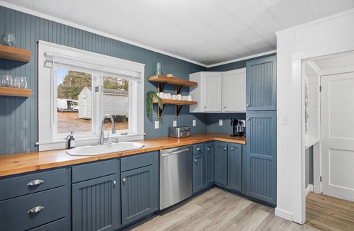Elkton House | Dreamy riverfront home with sandy beach, hot tub, fire pit, kayaks & fishing