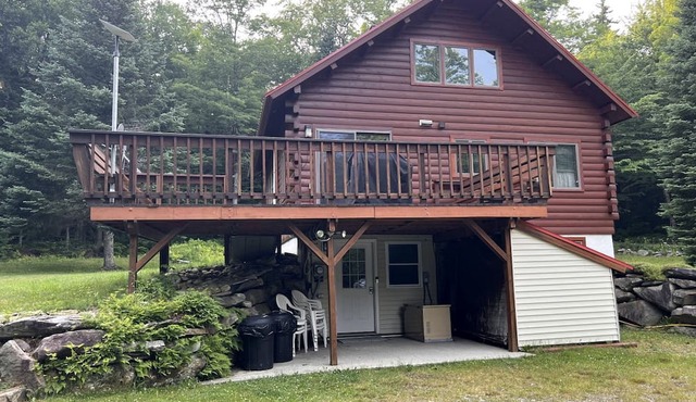 Fantastic Lakefront Wooden Cabin Settled Between Trees in Stratton, Vermont
